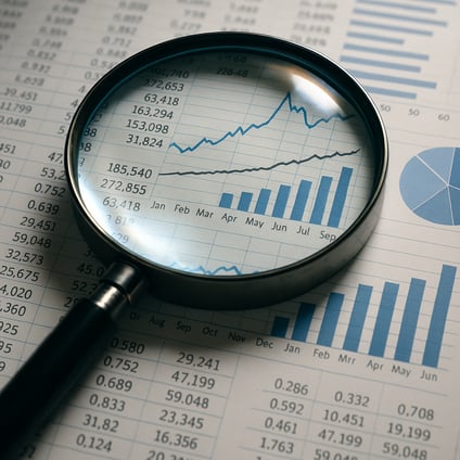 A magnifying glass is positioned above a collection of data its curved lens enlarging the fine details and patterns hidden within the text and numbers The glass glimmers under the light highlighting specific areas of interest as it focuses on intrica-1